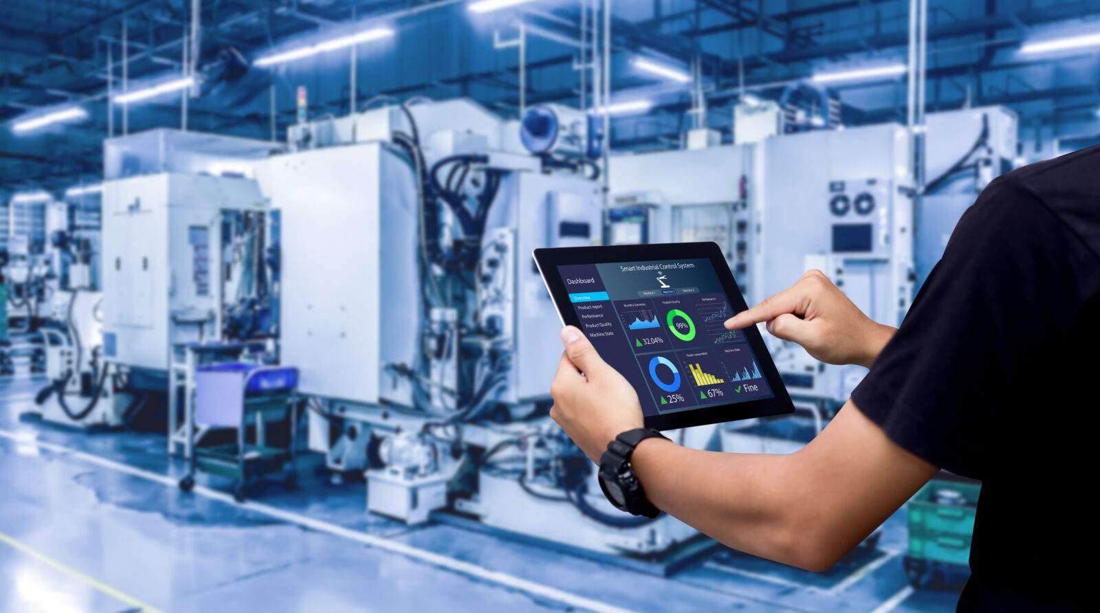 human arm using a tablet in a manufacturing setting